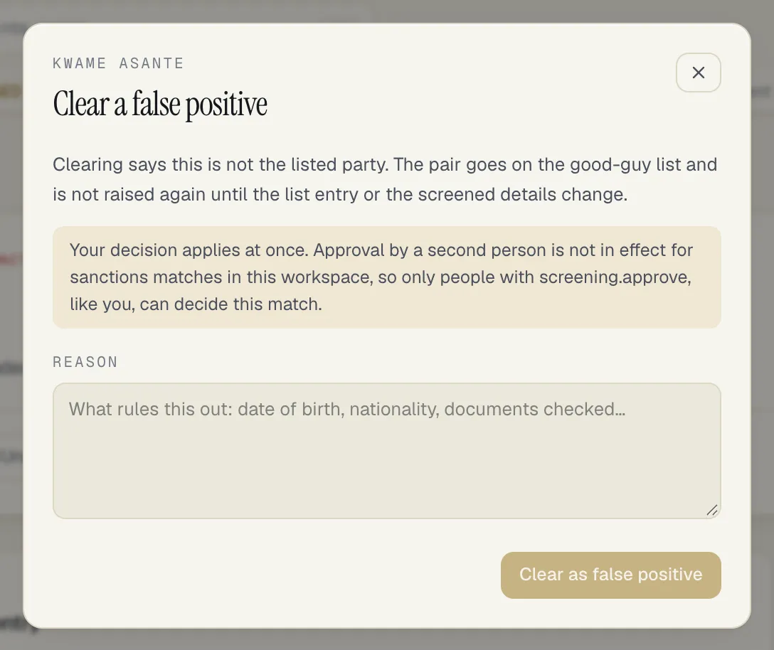 The Clear a false positive sheet: what clearing does, a note that the decision applies at once because approval by a second person is not in effect and only people with screening.approve can decide the match, a Reason box and the Clear as false positive button
