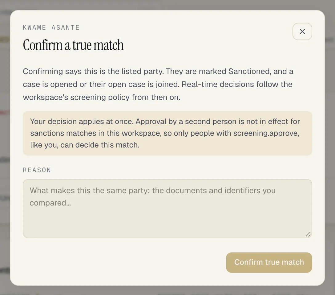 The Confirm a true match sheet for a sanctions match: the party will be marked Sanctioned and a case opened or joined, a note that the decision applies at once because approval by a second person is not in effect and only people with screening.approve can decide the match, a Reason box and the Confirm true match button